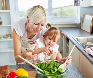 Attractive mother and child cooking